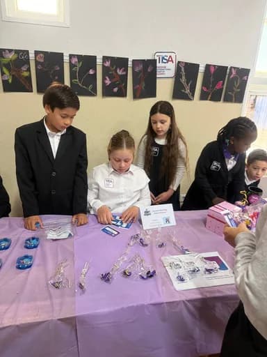 TISA MBA students selling their own products at a market stall